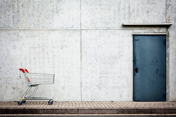 Urban scene with empty shopping cart.