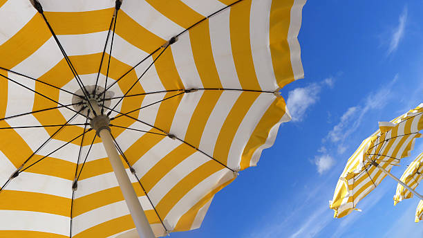 istock Yellow Striped Sun Umbrellas 171576947