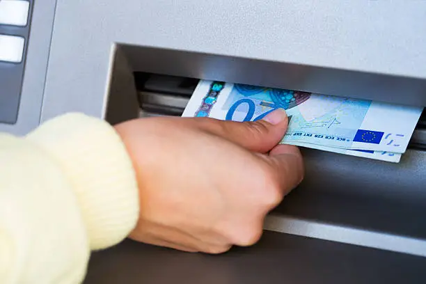 Getting cash from ATM..twenty euro bills