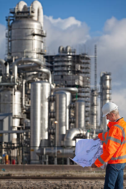 istock Petrochemical inspector with drawing 171577000