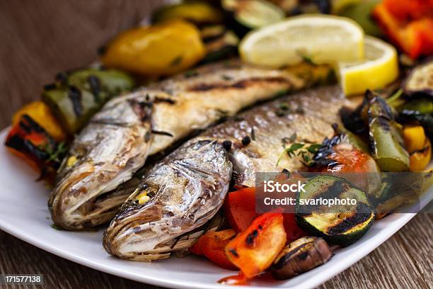 Sea Bass With Grilled Vegetables Stock Photo - Download Image Now - Fish, Grilled, Barbecue - Meal