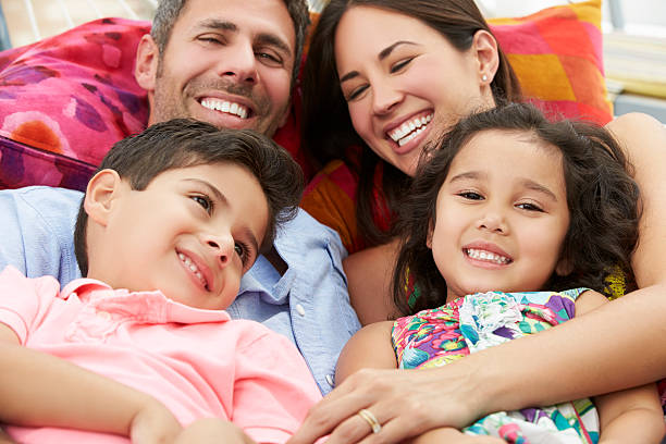 istock Family Relaxing In Garden Hammock Together 171577149