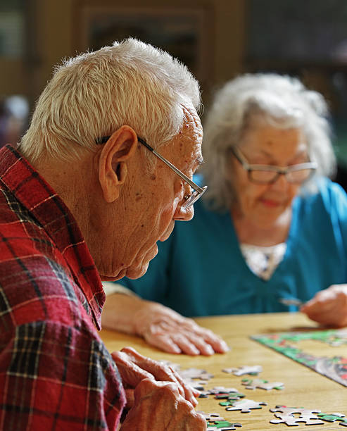 istock Senior Couple Doing Jigsaw Puzzle Together 171577235