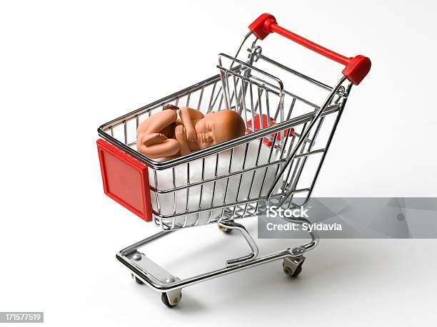 Buying And Selling Of Babies Stock Photo - Download Image Now - Newborn, Shopping Cart, Aluminum