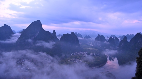 Asia,China,Guilin,Yangshuo,Xingping,Xianggong hill.
Yangshuo is a world famous tourist resort.
Yangshuo is a county of guilin prefecture.
Guilin karst has been included in the world heritage list.
Here the Li River snakes through a fairy-tale landscape of conical limestone peaks,its smooth waters exquisitely mirroring the magical.
Stand at the top of the hill to see the Lijiang River,
Lijiang River and its tributaries,the shuttle in the 
ShiShanfeng forest,mountains and water and hold,very beautiful.
Beautiful Lijiang River,is the world's largest and most beautiful karst landscape scenic resort.
It's the most beautiful landscape waterway has about 15 km.
Large numbers of tourists visit the Li river by yachts every year.