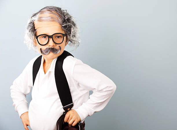 They Grow Up Fast Little boy dressed as an old man. carnival costume stock pictures, royalty-free photos & images
