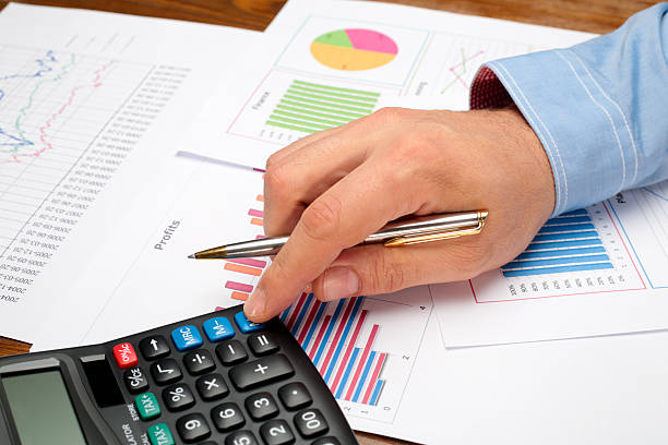istock Business Meeting, man's hands pointing on graphs 171577784