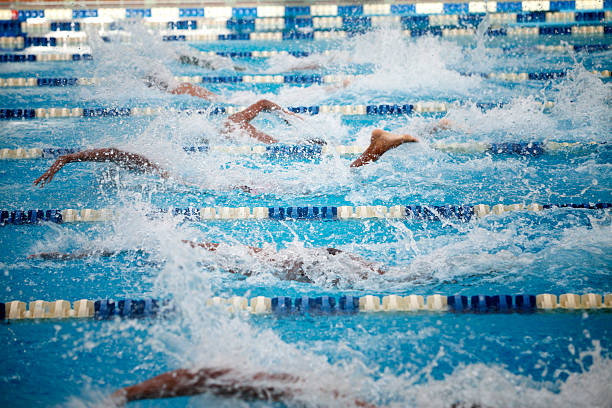 Swimmers Swimmers in Olympic pool (competition). the olympic games stock pictures, royalty-free photos & images