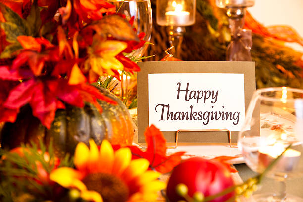 istock Happy Thanksgiving place setting. Autumn flower centerpiece. Table. 171578270