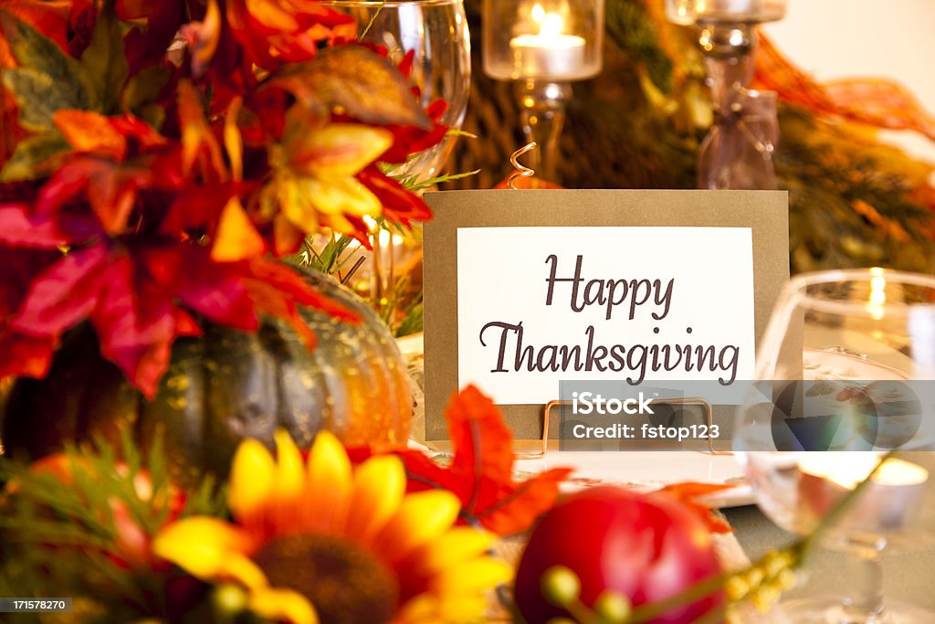 Happy Thanksgiving place setting. Autumn flower centerpiece. Table. Happy Thanksgiving place setting.    Thanksgiving - Holiday Stock Photo