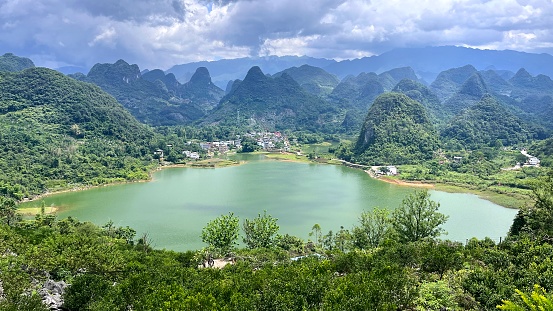 Asia,China,Guilin,Yangshuo,Xingping,\nYangshuo is a world famous tourist resort.\nYangshuo is a county of guilin prefecture.\nGuilin karst has been included in the world heritage list.\nThis is the famous \