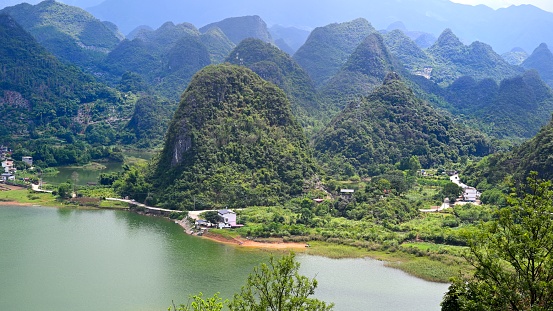Asia,China,Guilin,Yangshuo,Xingping,\nYangshuo is a world famous tourist resort.\nYangshuo is a county of guilin prefecture.\nGuilin karst has been included in the world heritage list.\nThis is the famous \