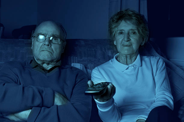 istock senior couple watching TV 171578726