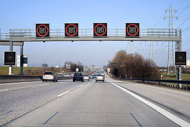 traffic information system auf highway- speed limit - number 120 stock-fotos und bilder