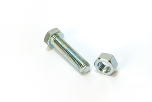 Threaded bolt and single nut isolated on white.More engineering images