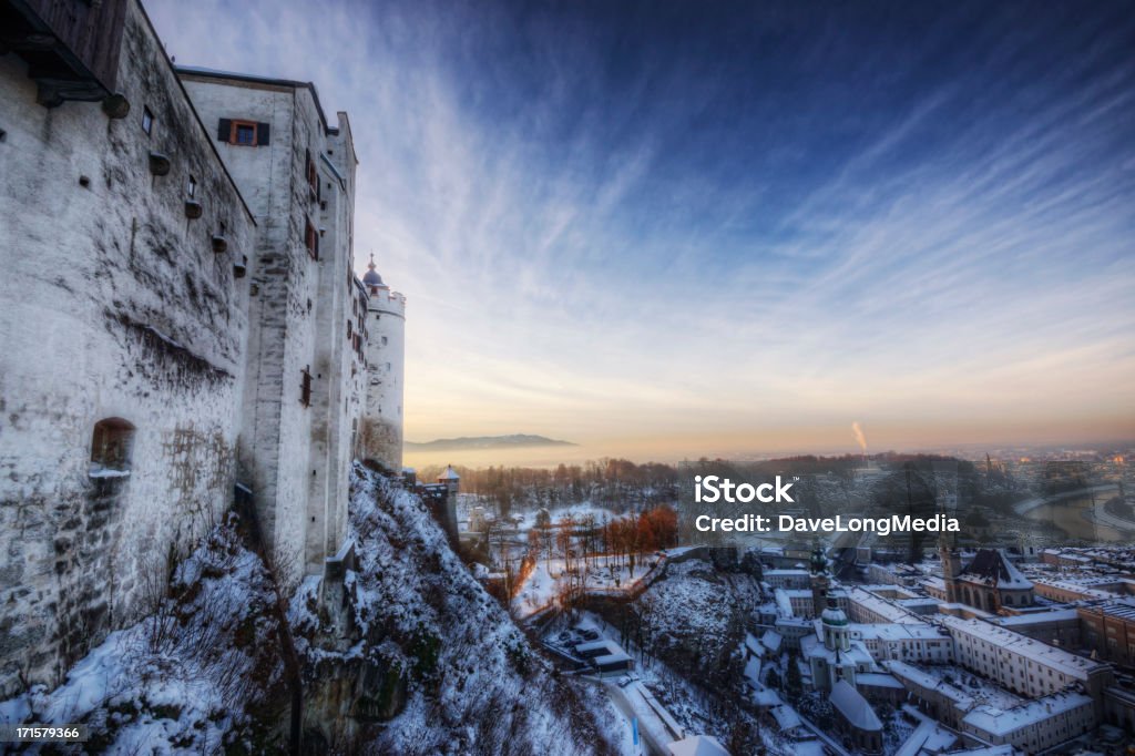 Castelo de inverno-pôr-do-sol - Foto de stock de Fortaleza de Hohensalzburg royalty-free