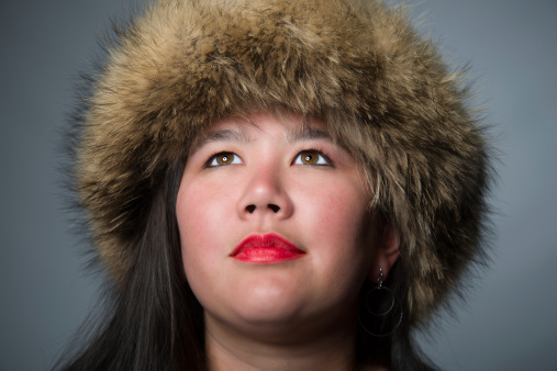 Young Woman in Winter Fur Hat