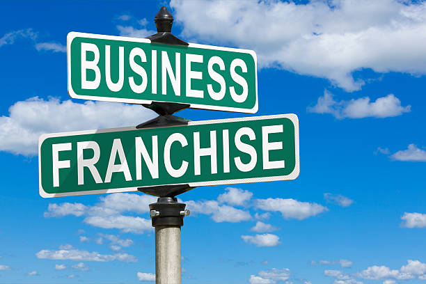Business Franchise Street Sign Business Franchise Street Sign franchising photos stock pictures, royalty-free photos & images
