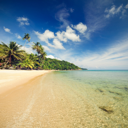 An idyllic tropical island beach in the Perhentian Islands in Malaysia, South East Asia.