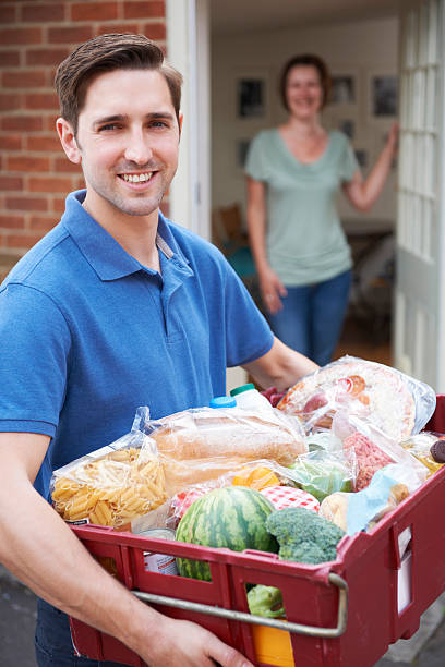 istock Driver Delivering Online Grocery Order 171579885