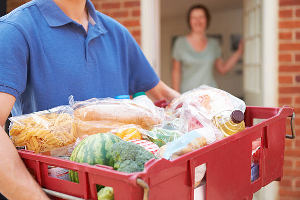 istock Driver Delivering Online Grocery Order 171580073