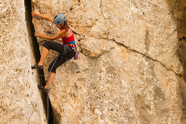 istock Woman rockclimbing 171580782