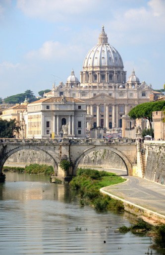 St. Peter's Basilica and Ponte St Angelo over a Tiber