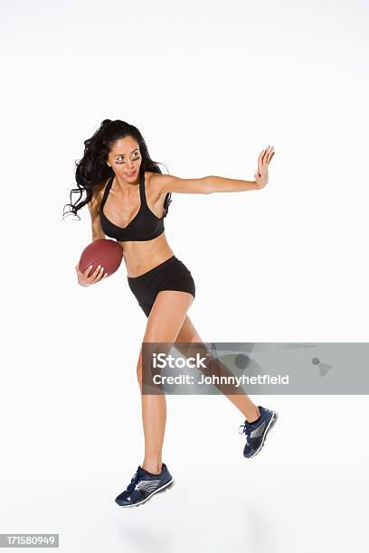 Kobieta W W Powietrzu Posiadających Piłka Do Rugby Gdy Wyświetlono Gest Stop - zdjęcia stockowe i więcej obrazów Neutralne tło