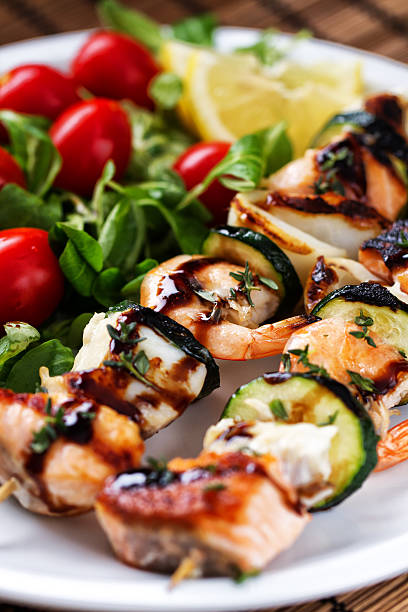 istock Fish skewers with salad 171581260