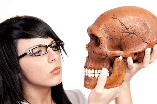 scientist with skull