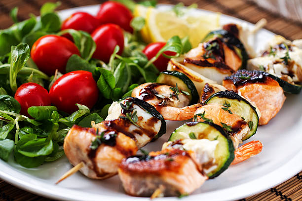istock Fish skewers with salad 171581386