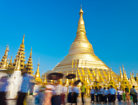 This giant golden temple is said to date back 2500 years and house some relics of the Buddha including his hair.(People Are Unrecognizable Due To Motion Blur, Done In Camera Not Through Editing)