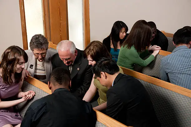 Photo of Church service group prayer