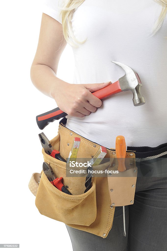 Home Improvement and Construction woman isolated on white concept op construction and home improvement Adult Stock Photo