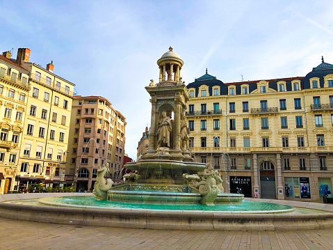 Lyon, France:  The fountain in Place des Jacobins, a 16th century square in the Presqu’ile district within the UNESCO World Heritage zone.