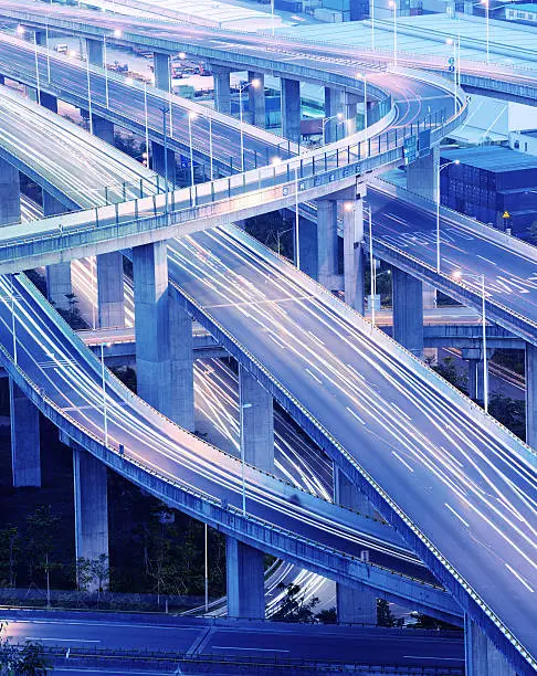 Motion blur of car lights on highway at night in Shenzhen, China.