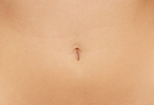 close up of woman navel