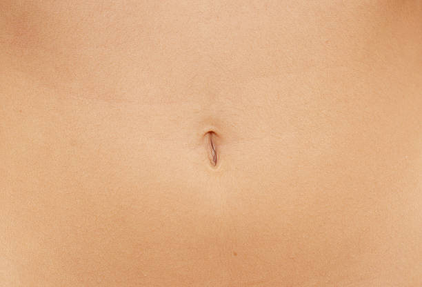 navel close up of woman navel female navel stock pictures, royalty-free photos & images