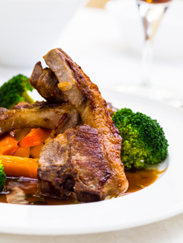 chargrilled freshness  hand cut lamb chop with honey roasted carrot,parsnip and steamed broccoli.service with freshness mint gravy.more food photos,Click my food lightbox please.