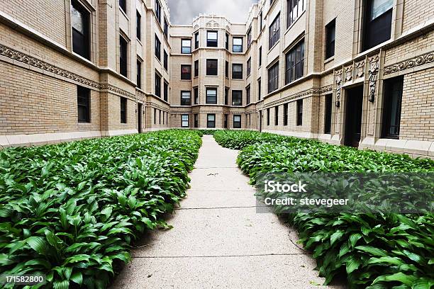 Apartment Buildings With Hostas In Rogers Park Chicago Stock Photo - Download Image Now