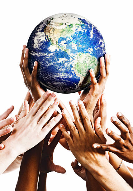 istock Hands cradling Planet Earth as others try to snatch it 171582929