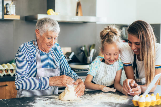 istock Three generation women making cookies and have fun 1715830096