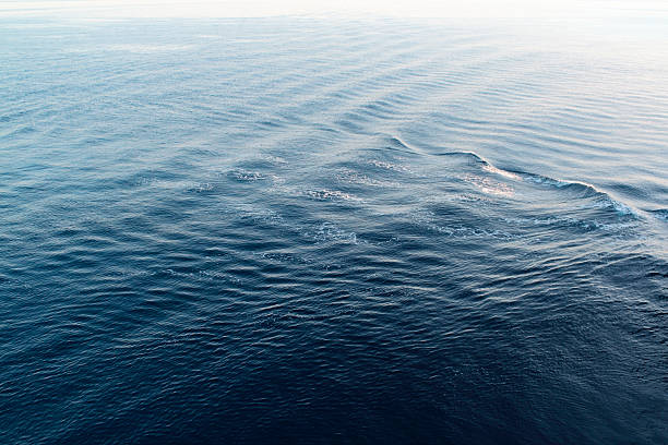 Sea Surface High angle view of sea waves wake water stock pictures, royalty-free photos & images