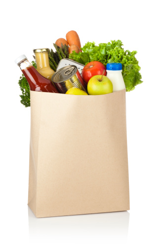 Paper Shopping Bag with Groceries Isolated on White Background