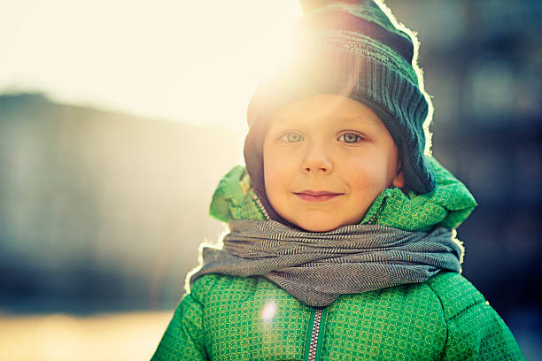 Urban portrait of a boy  kids winter coat stock pictures, royalty-free photos & images