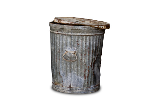 Rusty old trashcan isolated on white with a clipping path included in the file to make it easy to cut out and put in your own background.