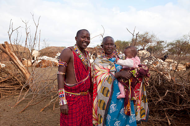 istock Young maasai warrior with baby and mother 171584709