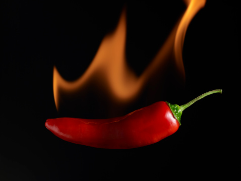 Flaming Hot Pepper on a black background (selective focus)Please see some similar pictures from my portfolio: