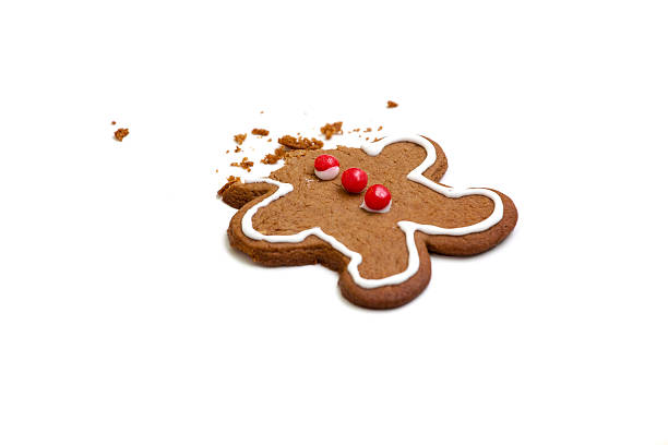 ヘッドレスジンジャーブレッドマン - cookie missing bite crumb eaten ストックフォトと画像