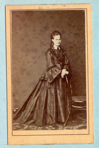 Vintage photo of young lady, 1870s